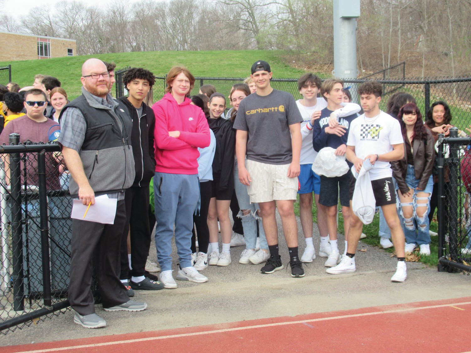 BRIAN’S BUNCH: Vice Principal Brian Bordieri stands at the gate with student egg collectors at the start of the first ever JHS Easter Egg Hunt.